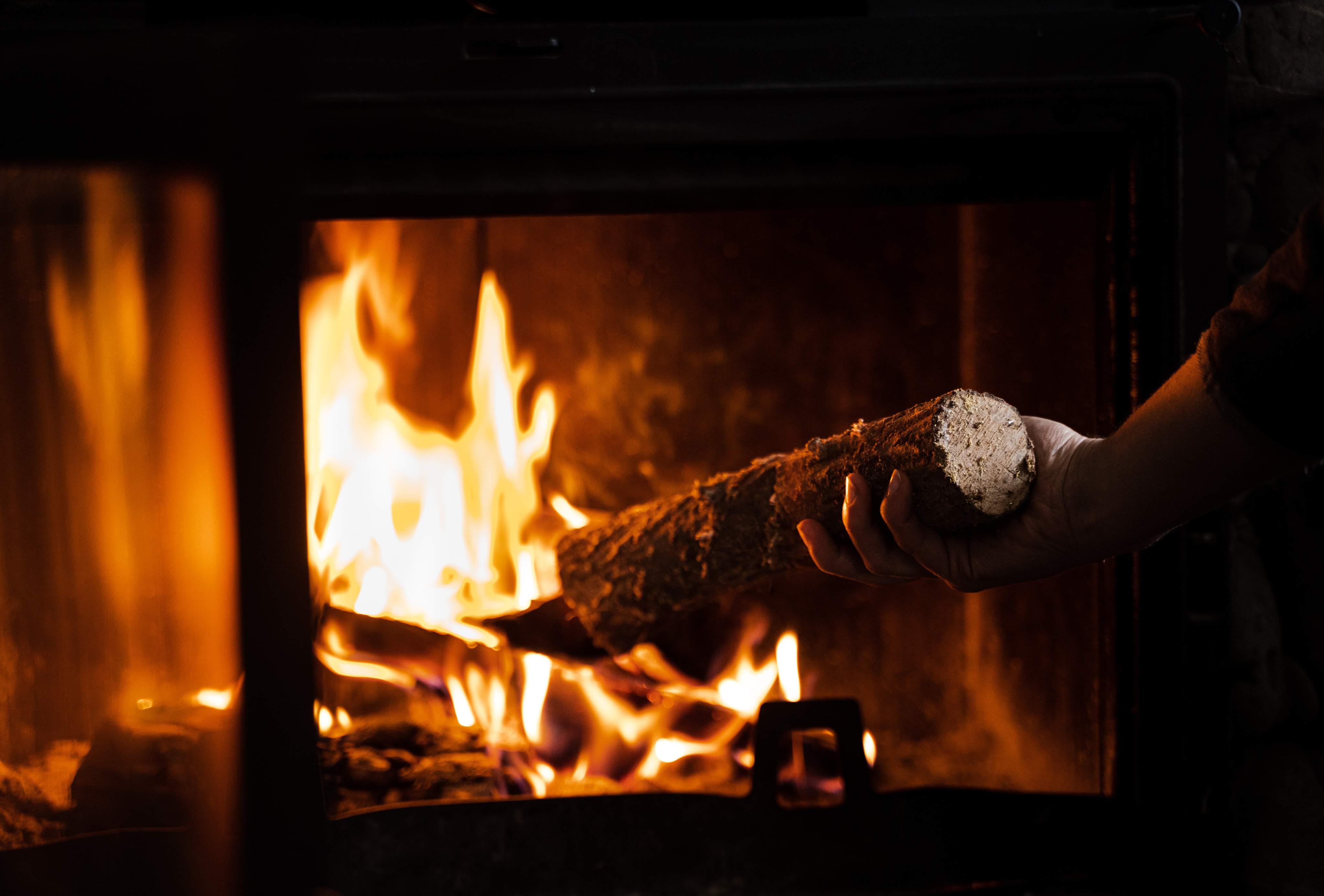 Classic brick fireplace with traditional mantel in family room